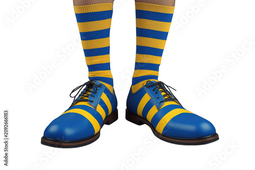 Person standing, wearing blue and yellow striped socks and matching eccentric shoes, showing unique fashion and style
