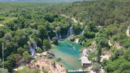 Kravica Waterfall, Bosnia and Herzegovina - June 7, 2026: Aerial panorama of visitors enjoying the famous Kravica Waterfall during summer