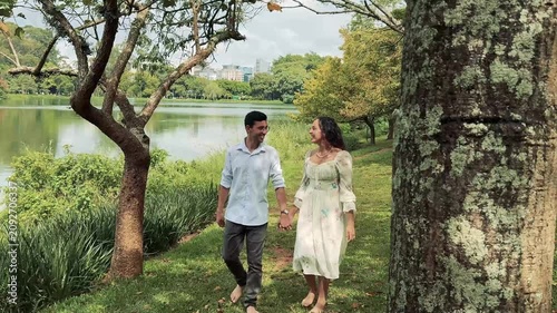 young couple walking in the park