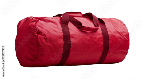 Foto Red duffel bag with dark red straps, isolated on transparent background