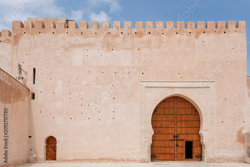 Canvas Print Rampart Wall with a Large Wooden Gate in the Medina, Meknes, Morocco