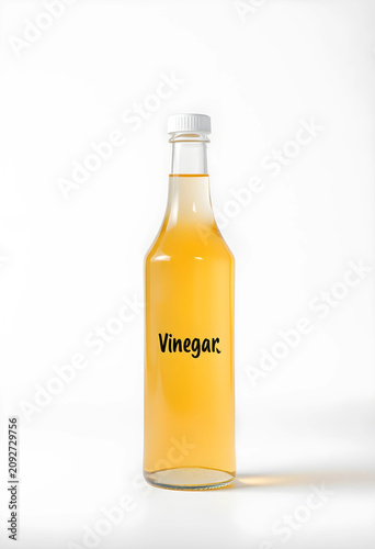 Bottle of vinegar on white ...