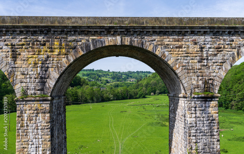 Historic aqueduct and railway viaduct designed by Thomas Telford, featuring canal engineering for the Llangollen Canal in Shropshire, UK.