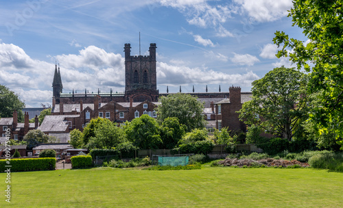 фотографія Panoramic view of the iconic Chester Cathedral from the verdant Deans Field against a summer sky