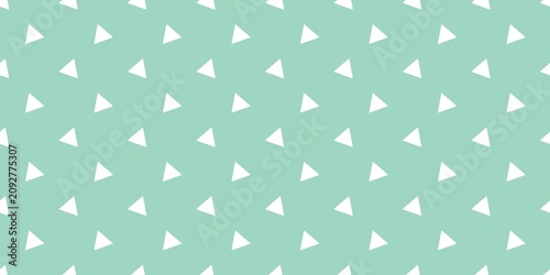 Schilderij op canvas Gentle white miniature triangles scattered over a pleasant mint aqua green surface