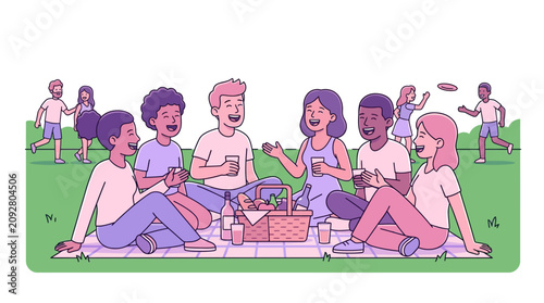 Diverse group of friends picnic.