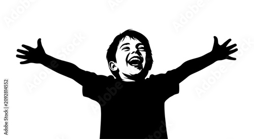 Silhouette of a joyful young boy with outstretched arms expressing pure happiness.