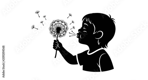 Black silhouette of a young child blowing on a dandelion flower.