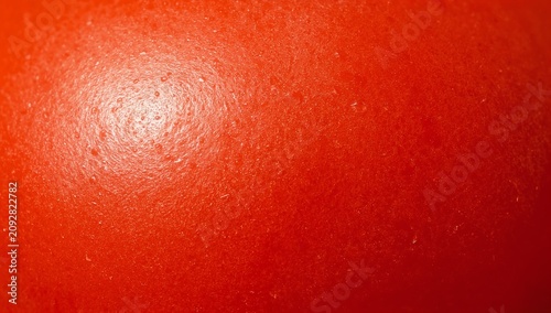 Close Up of Red Tomato Skin with Textured Surface and Bright Lighting