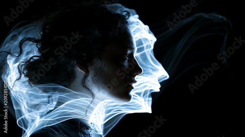 A creative portrait representing the duality of thought through smoke effects and silhouette artistry.
