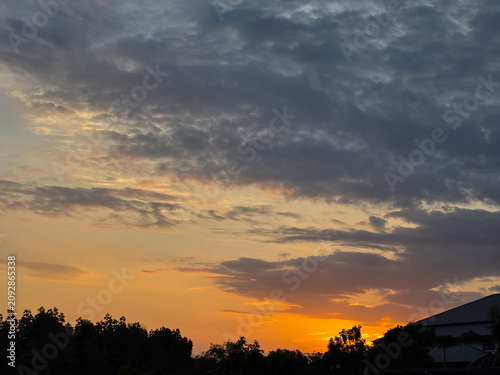  Sunset sky clouds in the Evening with Golden orange sunlight in golden hour, Dusk sky background