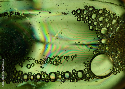 Bild auf Leinwand Plastic bottle polarized light creating colourful stress lines