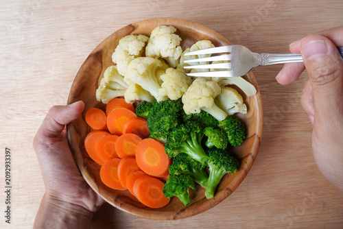 Fotografi Steamed vegetables for diet menu on a plate