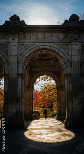 Stone Archway Leading to Autumn Garden Pathway.