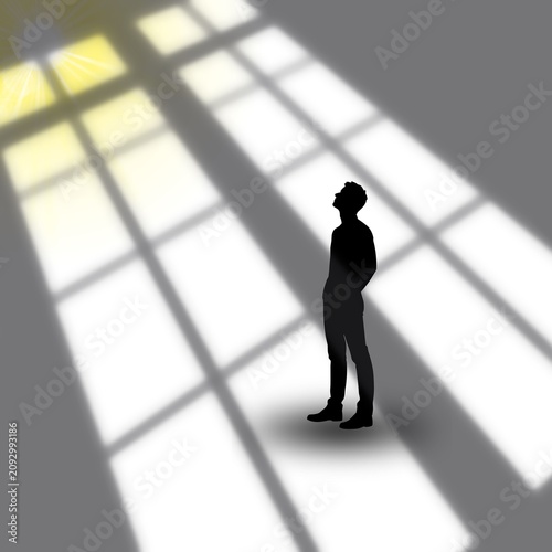 Photos A silhouette of a man gazing at the sunlight