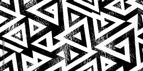 Fotografie Intricate geometric maze pattern with sharp angles and contrasting black and whi