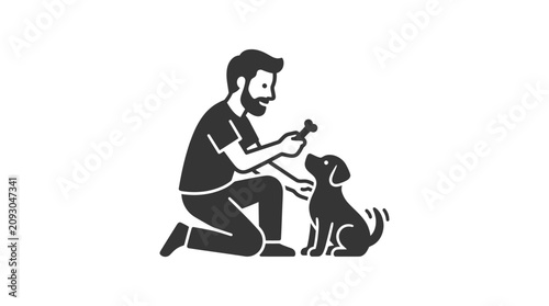 Fotografie Man kneeling with a dog.