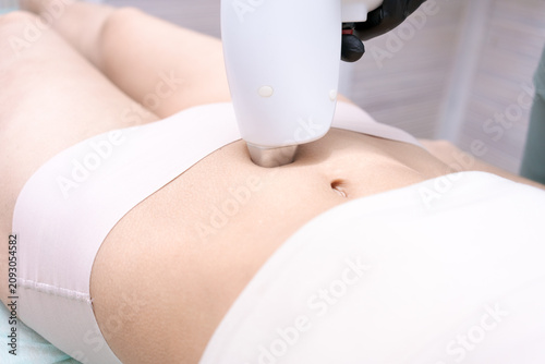 Laser Hair Removal on a Womans Abdomen Close Up