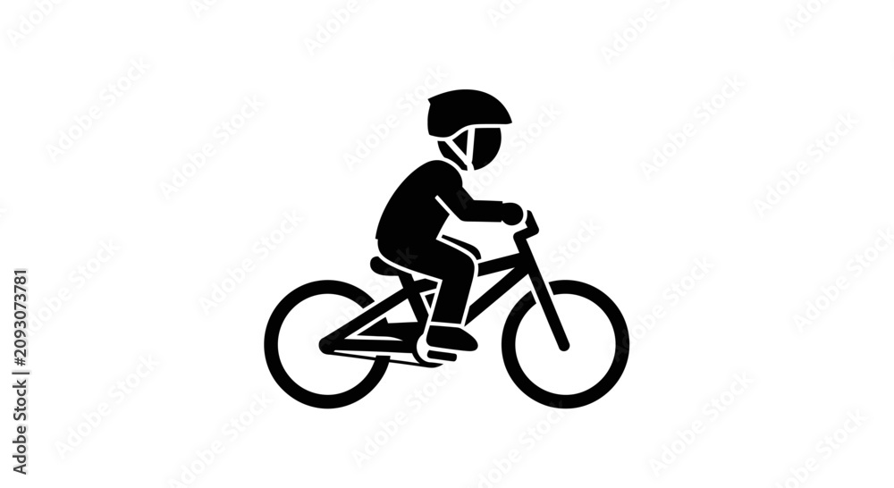 Obraz premium Silhouette of a young child riding a bicycle wearing a helmet.