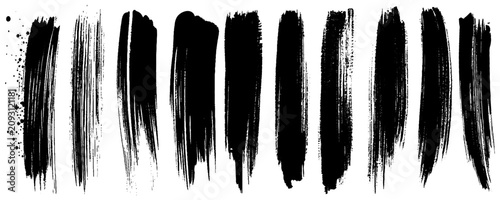 Fotografie A detailed image of numerous fingerprint smudges arranged in rows on a plain white surface