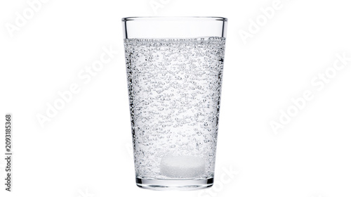 Photos Glass of fizzy water with dissolving tablet