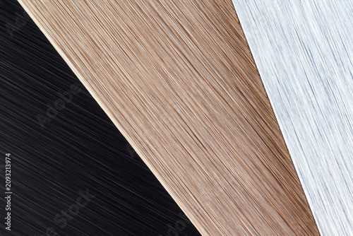 Geometric abstract background with contrasting wood grain and matte black textures