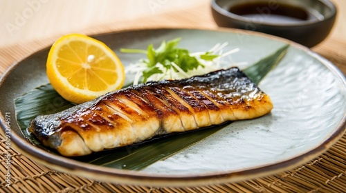 sudachi. A thin slice of green sudachi citrus beside grilled fish on a ceramic plate. menu design, packaging mockups, designed for culinary blogs and recipe cards for restaurants.