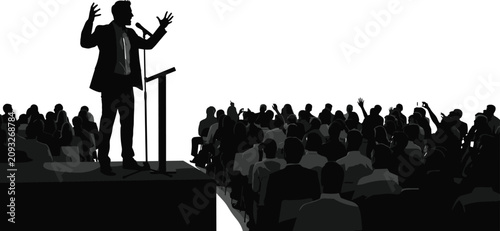 Фотография Silhouette of speaker at podium addressing audience with raised hands in public