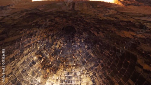 Descending inside Mycenaean Treasury of Atreus tholos tomb