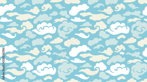 Canvas Print A serene light blue sky filled with white and cream colored fluffy clouds