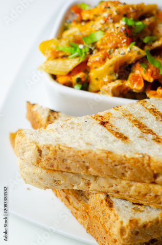 Grilled toast slices with distinct char marks