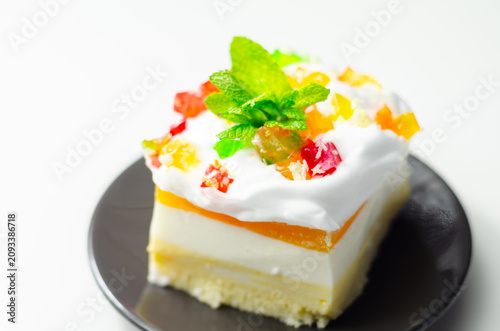 White plate holds a layered dessert