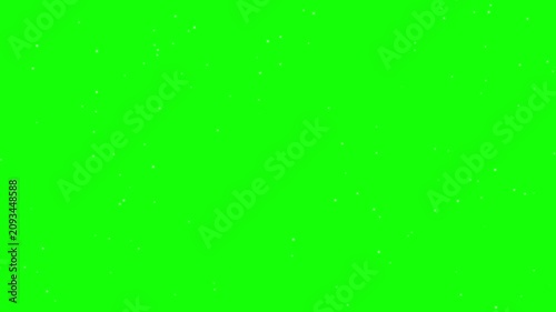 Floating white dust particles over a vibrant solid green screen background overlay