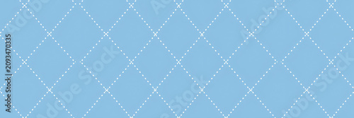 Seamless Blue Background Pattern with White Diamond Stitching Texture