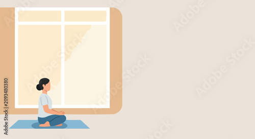 Valokuva A woman sits in a peaceful meditative pose on a blue yoga mat in front of a large window, enjoying a moment of calm and mindfulness
