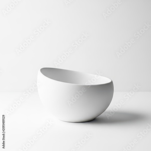 A minimalist white ceramic object seamlessly blending into a bright white studio background, creating a clean and elegant ethereal effect, minimalist, subtle, soft