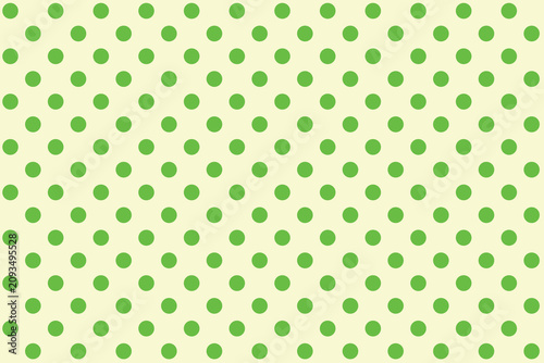 Plakat w ramie Green colour polka dots pattern over Lt Goldenrod Yello colour useful as a background.