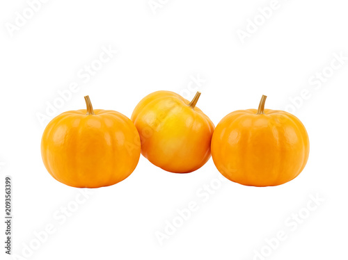 Three orange pumpkins isolated on transparent background. Fresh autumn gourds for harvest. Seasonal holiday decor.