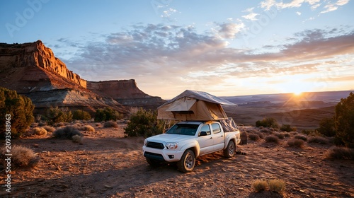 premium camping car with rooftop tent in remote canyon, dramatic sunrise, exploration lifestyle, realistic travel photography