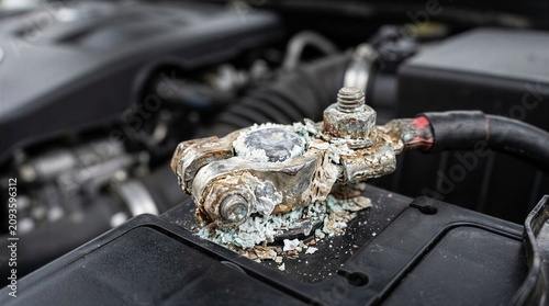 Heavily Corroded Car Battery Terminal with Acid Buildup — Vehicle Breakdown and Automotive Maintenance Need Concept