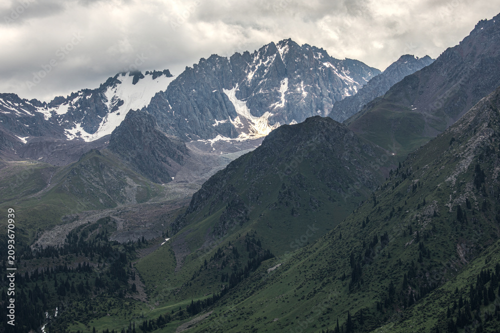 Fototapeta premium Landscape Kazachstan, mountain, peak, trees, blue, clubs, green, snow, 
