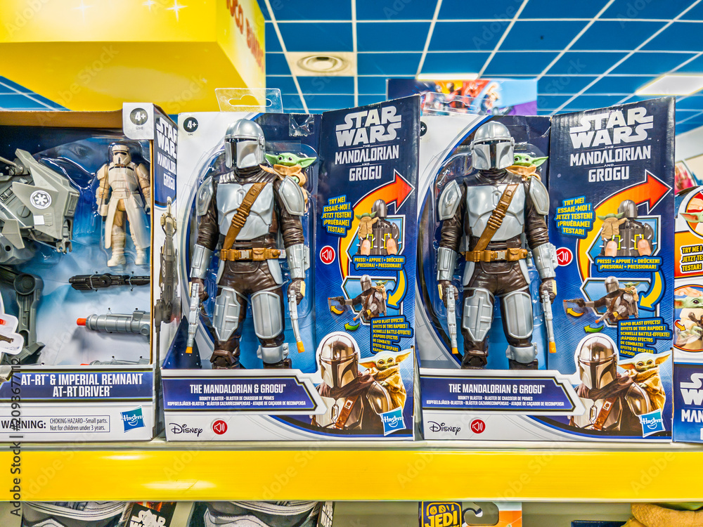 Fototapeta premium Italy - July 10, 2026: boxed Star Wars action figures displayed on retail shop shelf. selection features the interactive Hasbro