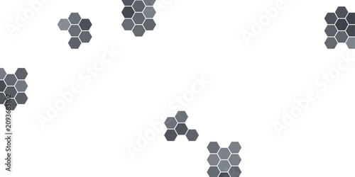 Abstract a pattern of scattered grey hexagons against a white background evokes a sense of organization and structure in a clean, minimalist design.