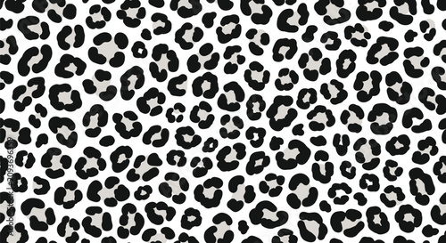 Seamless black and white leopard print pattern with organic spots for sophisticated textile and fashion surface designs.