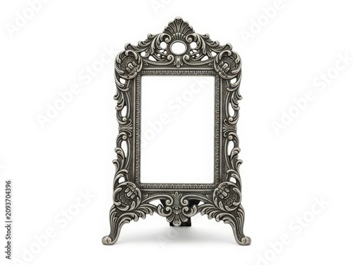 Antique ornate mirror with intricate floral design and elegant stand