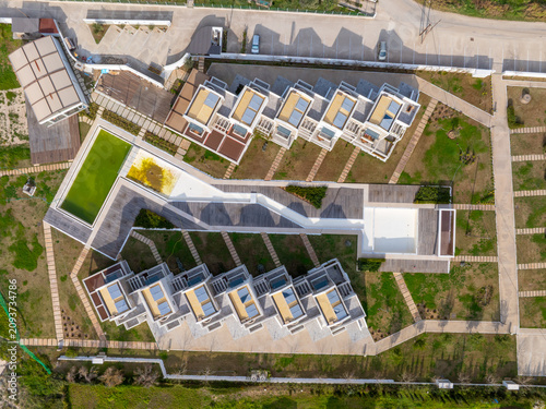 Aerial Top Down View of Modern Holiday Resort Complex with Geometric Architecture in Corfu Greece
