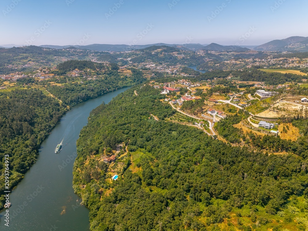 Obraz premium Aerial view of Douro valley and vineyards in the hills, Porto, Portugal. 