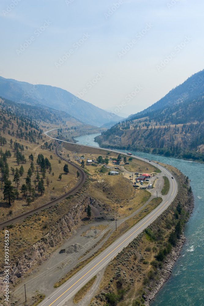 Fototapeta premium Aerial View of Thompson River Valley and Highway in Bighorn, British Columbia, Canada