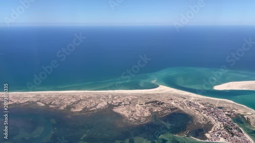 Flying over Faro coastline in Portugal