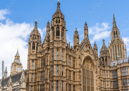 Photography West facade of the Palace of Westminster along Abingdon Street, Gothic Revival masterpiece designed by Charles Barry and Augustus Pugin (1840–1870), a UNESCO World Heritage Site, London, UK
